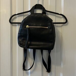Fossil Black Leather Backpack with Gold Accents